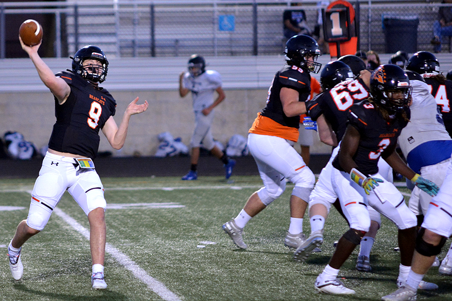 Sophomore+quarterback+Brant+Hayden%2C+%239%2C+completes+a+pass+in+the+North+Forney+scrimmage+Sept.+17.