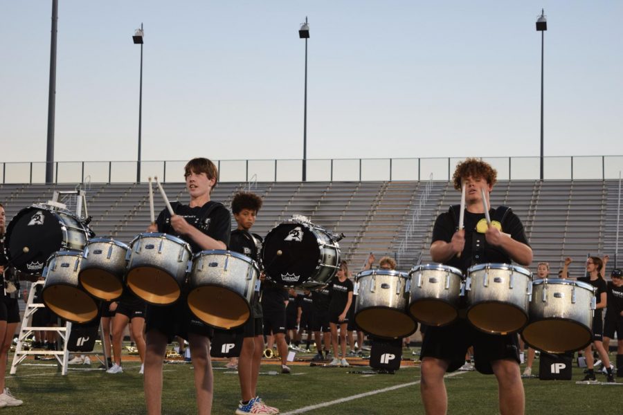 The drum line performs crowd favorites, as evidenced by the dancing in the stands and in the rest of the band.