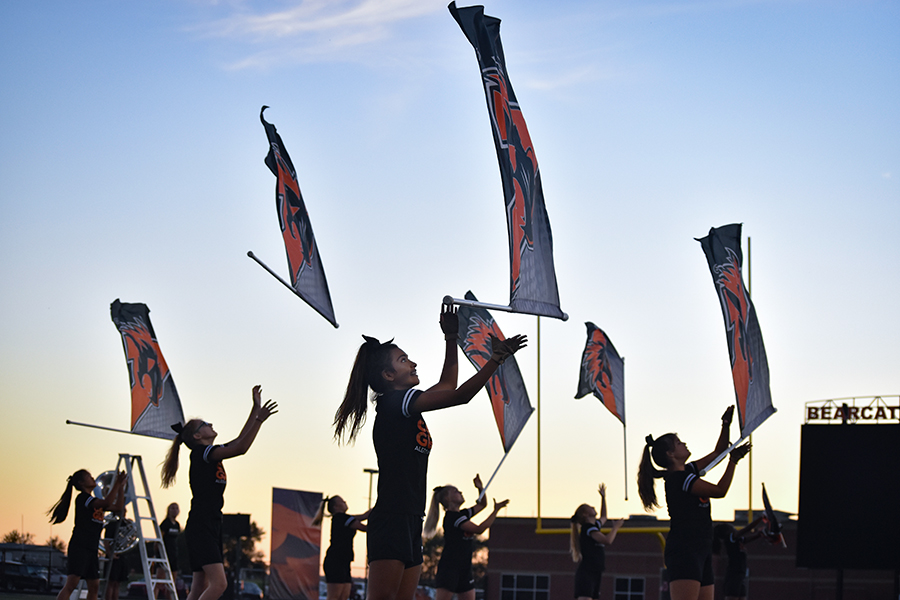 Color Guard takes the field with the Bearcat Regiment at Meet the Band Sept. 29.