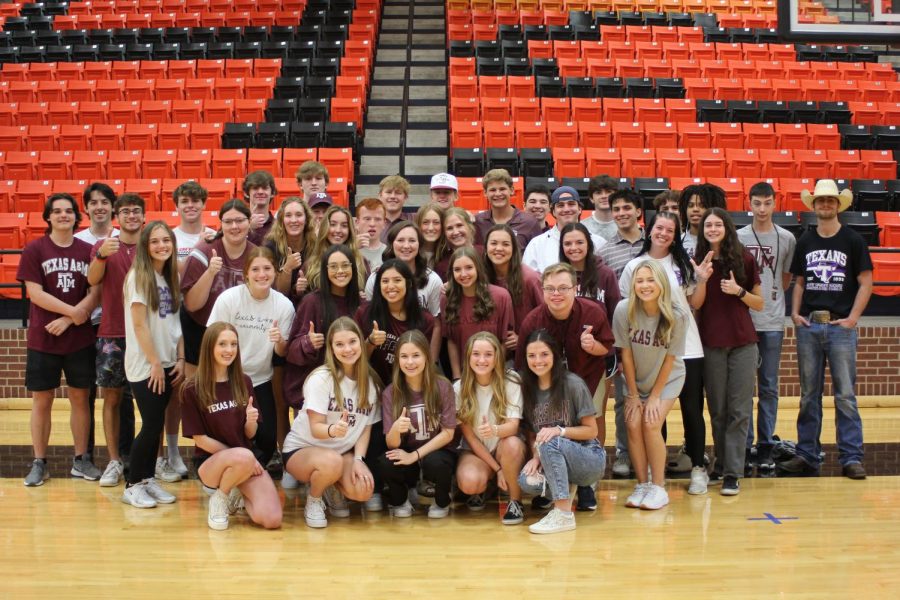 Senior Travis Decker and the others who plan to attend Texas A&M gather on senior day, April 28, in the gym. Decker was accepted into both A&M’s Aggie ACHIEVE program and the UNT ELEVAR program.
