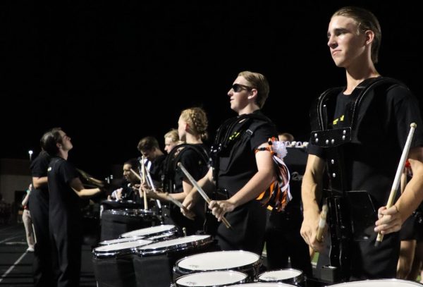 During 3rd quarter, the Bearcat Drum Line marches the sidelines at the varsity Homecoming Football game, on Sept. 20, 2024. 