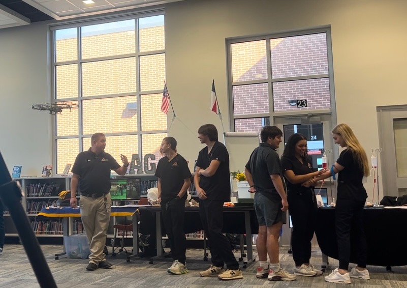 High school students volunteer at Aledo middle school for the CTE fair to help recruit future students Tuesday, Nov. 12 